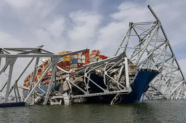 Baltimore bridge collapse paralyzes major car port, costs billions, affects 8,000 jobs.